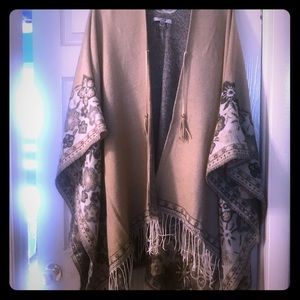 Tan floral poncho.